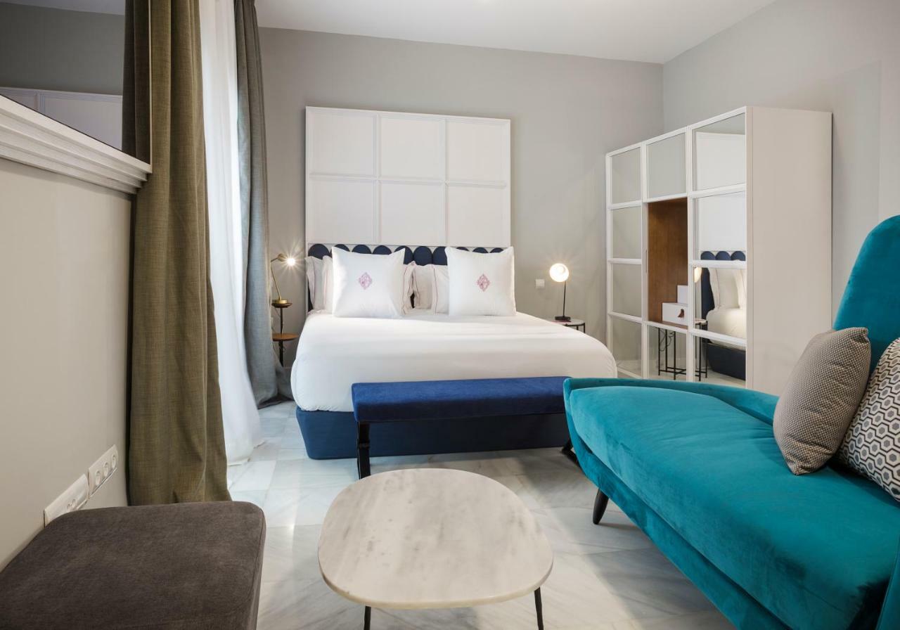 Apartamentos One Shot Conde De Torrejon 塞维利亚 外观 照片