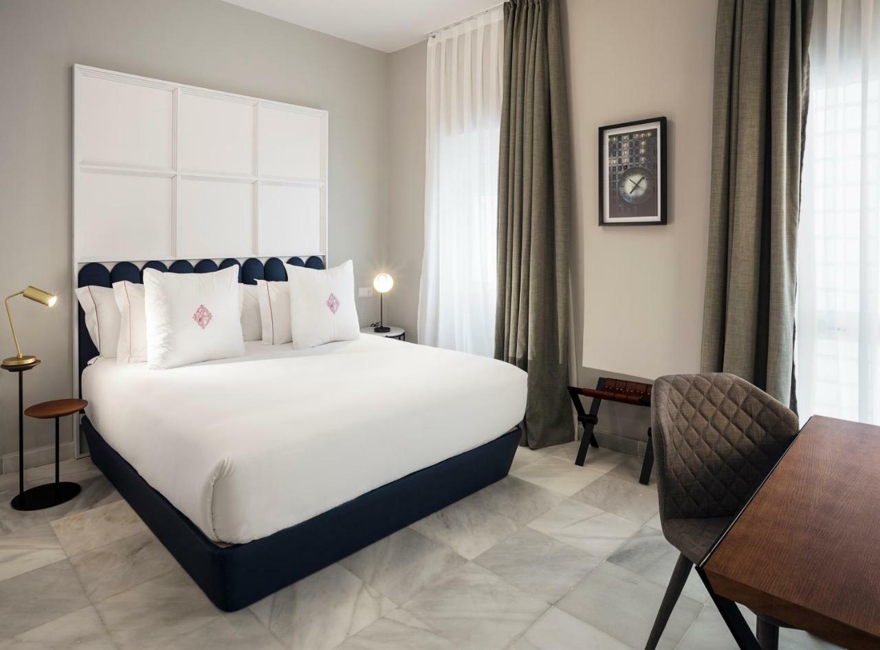 Apartamentos One Shot Conde De Torrejon 塞维利亚 外观 照片