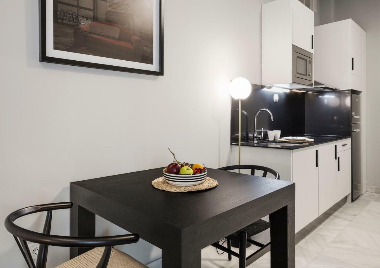 Apartamentos One Shot Conde De Torrejon 塞维利亚 外观 照片