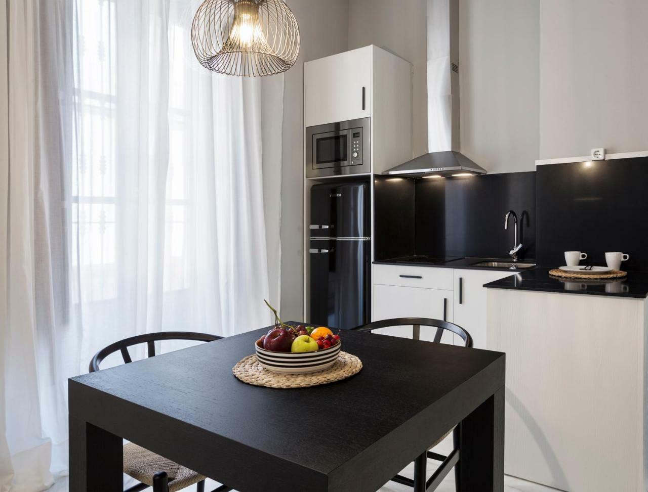 Apartamentos One Shot Conde De Torrejon 塞维利亚 外观 照片