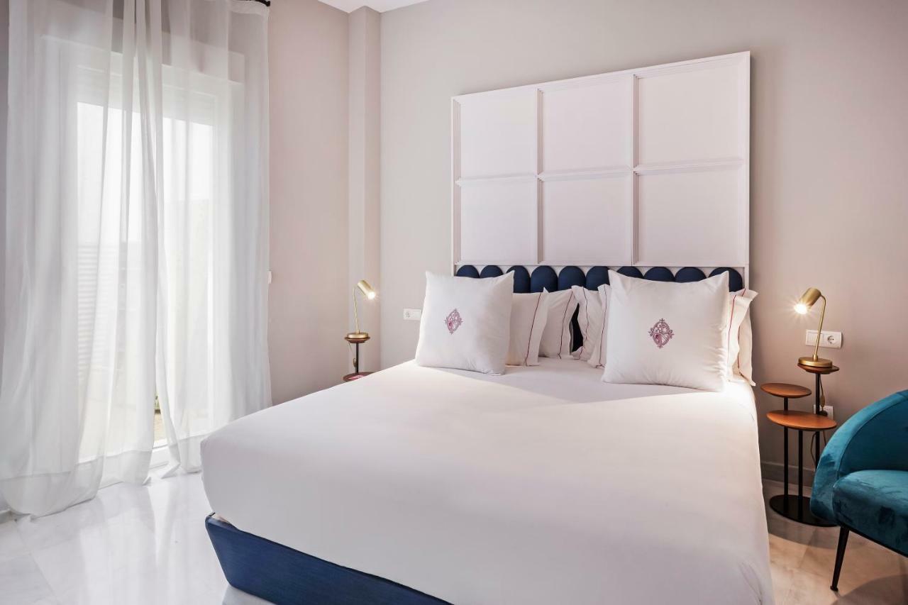 Apartamentos One Shot Conde De Torrejon 塞维利亚 外观 照片