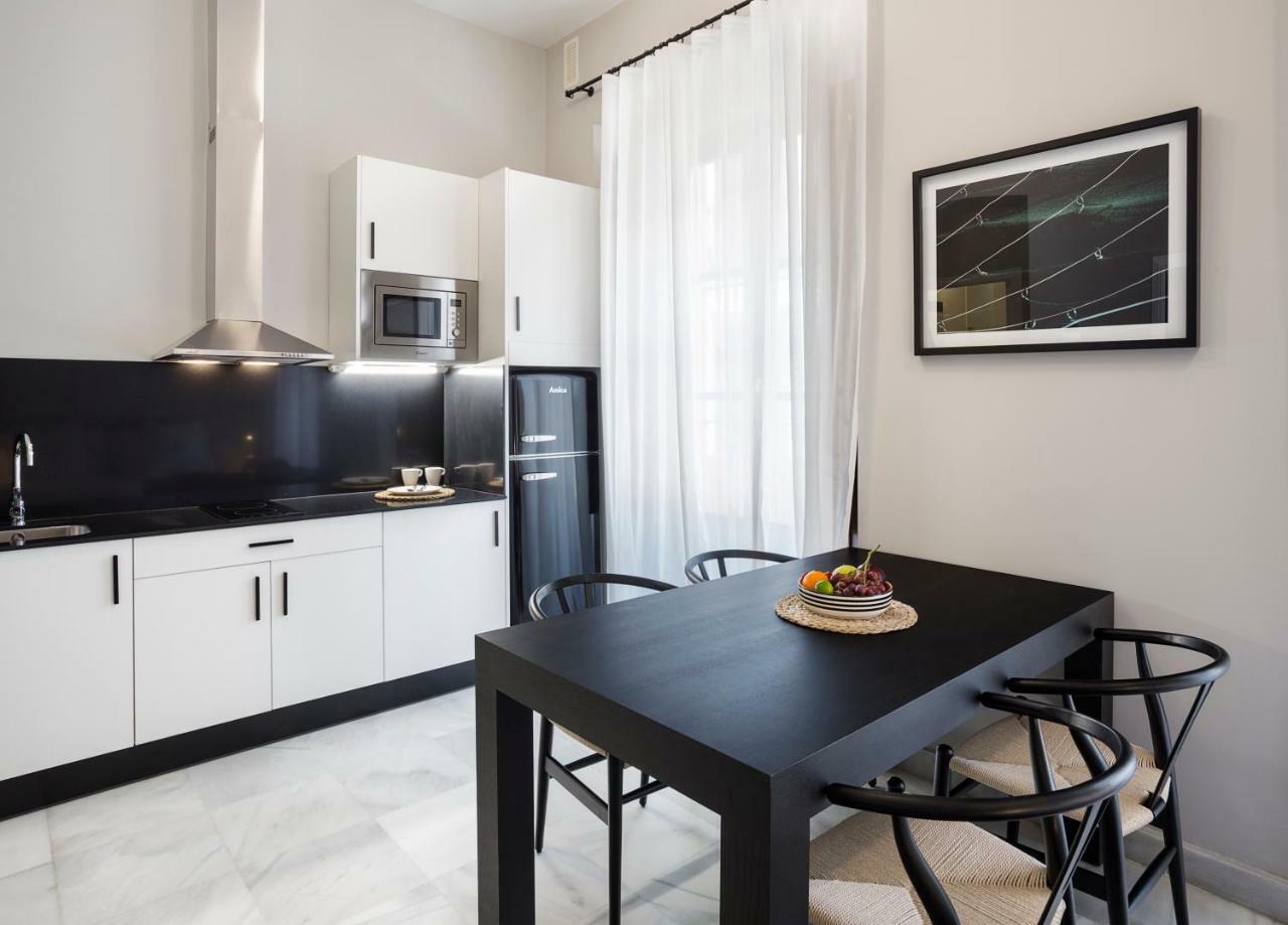 Apartamentos One Shot Conde De Torrejon 塞维利亚 外观 照片
